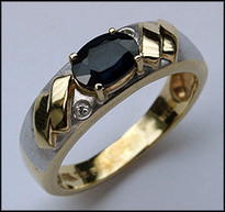 Oval Sapphire Ring set in Two Tone 14kt Gold