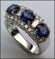 3 Stone Sapphire Ring with .84ct F Color Diamonds