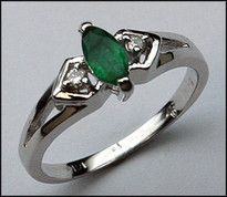 3 Stone Marquise Emerald and Diamond Ring