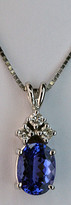 Oval Tanzanite Pendant with Three Diamonds