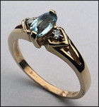 14kt Gold Blue Topaz and Diamond Ring R642