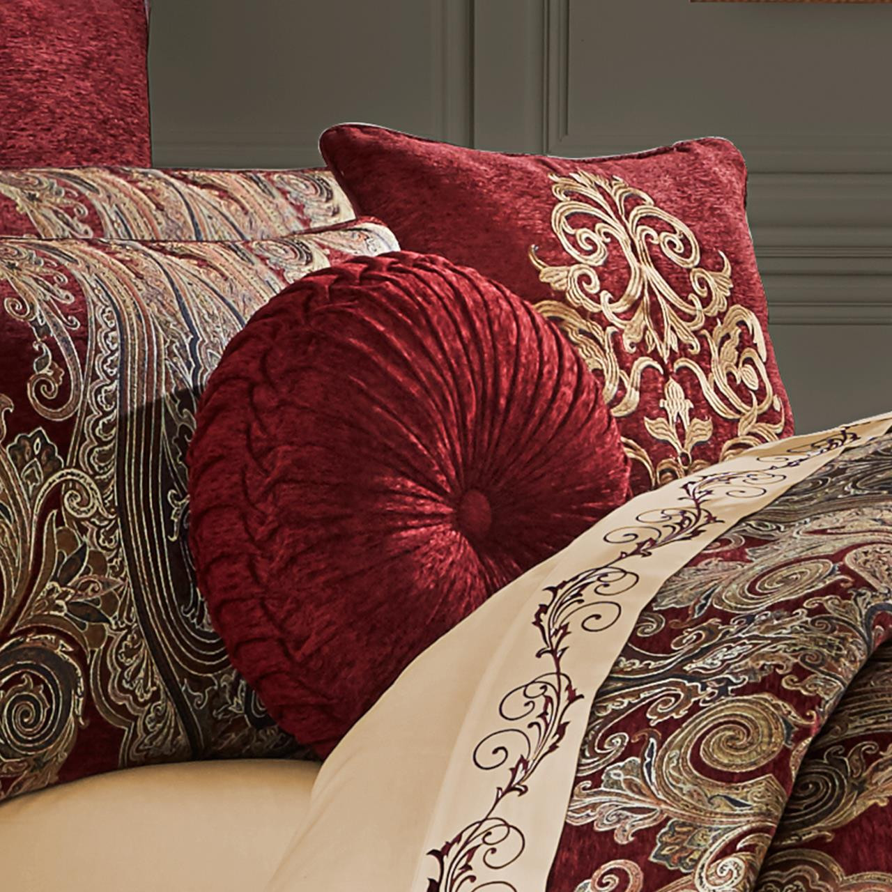 https://cdn10.bigcommerce.com/s-9ese1/products/18360/images/116305/Garnet-Red-Tufted-Round-Pillow-193842111352_image2__71650.1595691493.1280.1280.jpg?c=2