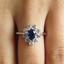 Pear Cut Blue Sapphire Gemstone Multi-Stone 9-Prong Halo Cocktail Ring with Round White Diamond Accents in White Gold - #CSFRQC9648