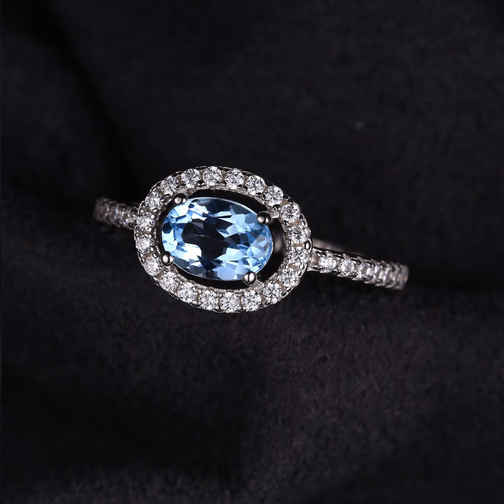 1 3/4 CTW Oval Blue Topaz Cocktail Ring in .925 Sterling Silver - Size ...