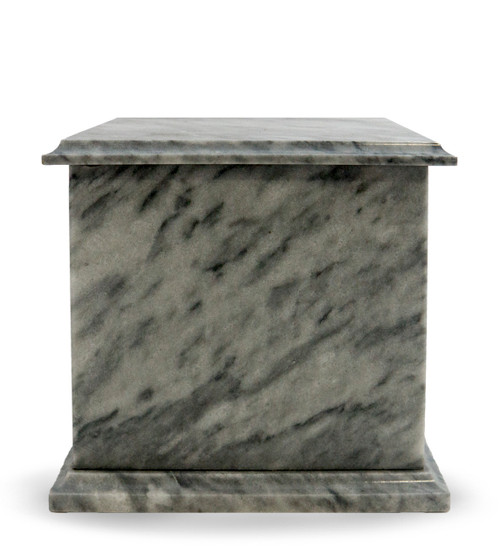 Modern Grey Marble Cremation Urn - The Cloud Grey Marble Urn is crafted from beautiful natural marble. Each urn is perfectly carved from a solid piece of marble and polished to shine. The main characteristic of this grey marble are irregular veining of grey and white.  Quarried and made from 100% real natural marble. Hand crafted from a solid piece of marble and polished to shine. Because it is natural, the color and pattern in each urn will vary.  The bottom is lined with felt to prevent scratches and provide stability and includes a threaded lid to secure ashes.

It’s the perfect vessel as a keepsake for display in your home, niche, funeral, columbarium, burial, scattering ashes, or as a reminder and in remembrance of their love and spirit.