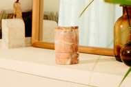 Toscano Rosemary Onyx Keepsake Urn - Rosemary Onyx Marble is a pink stone that features pinkish red color, earthy browns, and white crystal with heavy random veins. Some may even include a greenish tone. Quarried and made from 100% real natural marble.  Hand crafted from a solid piece of marble and polished to shine. Because it is natural, the color and pattern in each urn will vary.  The lid can be sealed with adhesive that can be found at a local hardware store.  Adhesive is included.