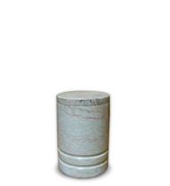 Toscano Natural Beige Marble Keepsake Urn For Ashes 
This urn is crafted from a natural marble in a seashell beige color, with thin to medium grain and irregular background. The main characteristic of this marble is the appearance of strong and well defined vein. This vein is moderately irregular, but it is what defines the uniqueness of this stone. Quarried and made from 100% real natural marble.  Because it is natural, the color and pattern in each urn will vary.  The lid can be sealed with adhesive that can be found at a local hardware store.  Adhesive is included.

It’s the perfect vessel as a keepsake for display in your home, niche, funeral, columbarium, burial, scattering ashes, or as a reminder and in remembrance of their love and spirit.
