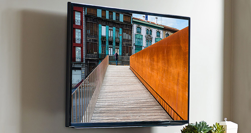 tilting wall mounted tv bracket looks great in any room with a low profile design