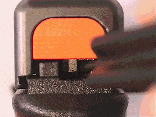 Pushing down on the trigger bar Pushing down on the trigger bar