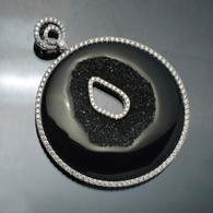 18 karat White Gold, Diamond Halo and Druzy Pendant
