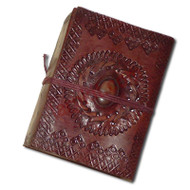 Small, leather-bound book.

The cover is made from brown leather with decorative thonging and set with a polished stone.

The 60+ inside pages are thick, handmade, cream-coloured paper, with a parchment feel.

A useful addition to your kit and perfectly suited to most historical settings.