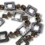Alexis Necklace. Geometric shaped Smokey Quarz and Shells are individually knotted for supreme style and security.