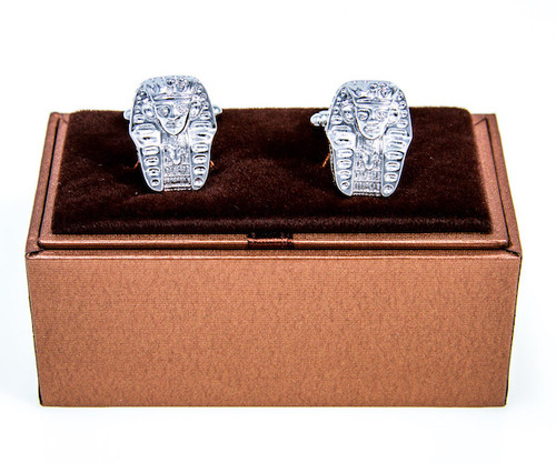 Silver Egyptian  King Pharaohs Head Cufflinks; King Tut Cufflinks shown as a pair displayed on presentation gift box close up image