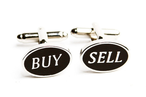 oval Buy Sell Cufflinks shown as a pair close up image