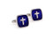 Blue square with silver cross cufflinks shown as a pair side by side close up image