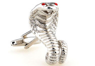 Silver Cobra snake cufflinks with red crystal eyes close up image
