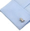 osprey cufflinks; flying eagle cufflinks displayed on a white dress shirt sleeve cuff close up image