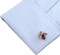 red enamel hornet wasp cufflinks displayed on a white dress shirt sleeve cuff close up image