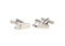silver hand saw cufflinks shown as a pair side angle view close up