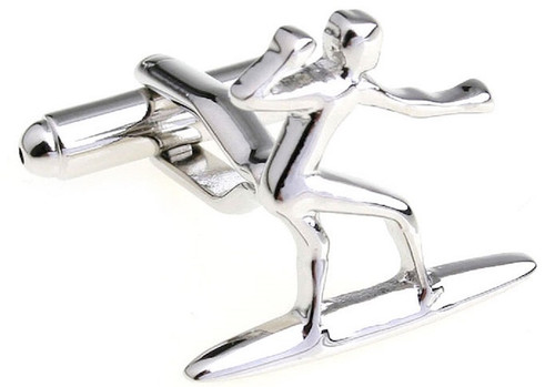 Surfer on surfboard cufflinks close up image