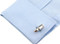 2 toned pointed tip bullet cuff links displayed on a white dress shirt sleeve cuff