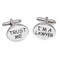 trust me I'm a lawyer cufflinks shown as a pair close up image design is oval shape with black text