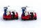 red white and blue golf cart cufflinks shown as a pair close up image