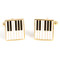 gold piano keys cufflinks shown as a pair close up image