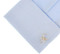 barrel monkey cufflinks displayed on a white dress shirt sleeve cuff close up image