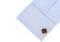 fire department emblem cufflinks displayed on a white dress shirt sleeve cuff