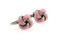 baby pink knot cufflinks shown as a pair close up image