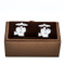 Vintage style motion film camera cufflinks with presentation gift box close up image