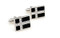 black enamel crystal cross cufflinks shown as a pair side by side close up image