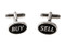 oval shaped buy sell cufflinks close up image