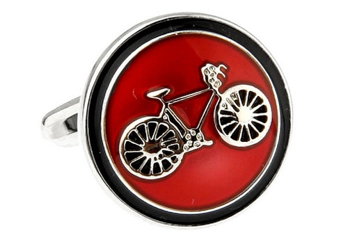 Round red button style cufflinks with silver bike in the center close up image