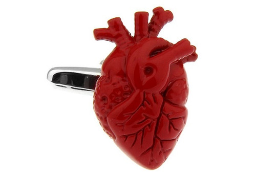 Anatomical red heart cufflinks with arteries and valves showing in detail close up image