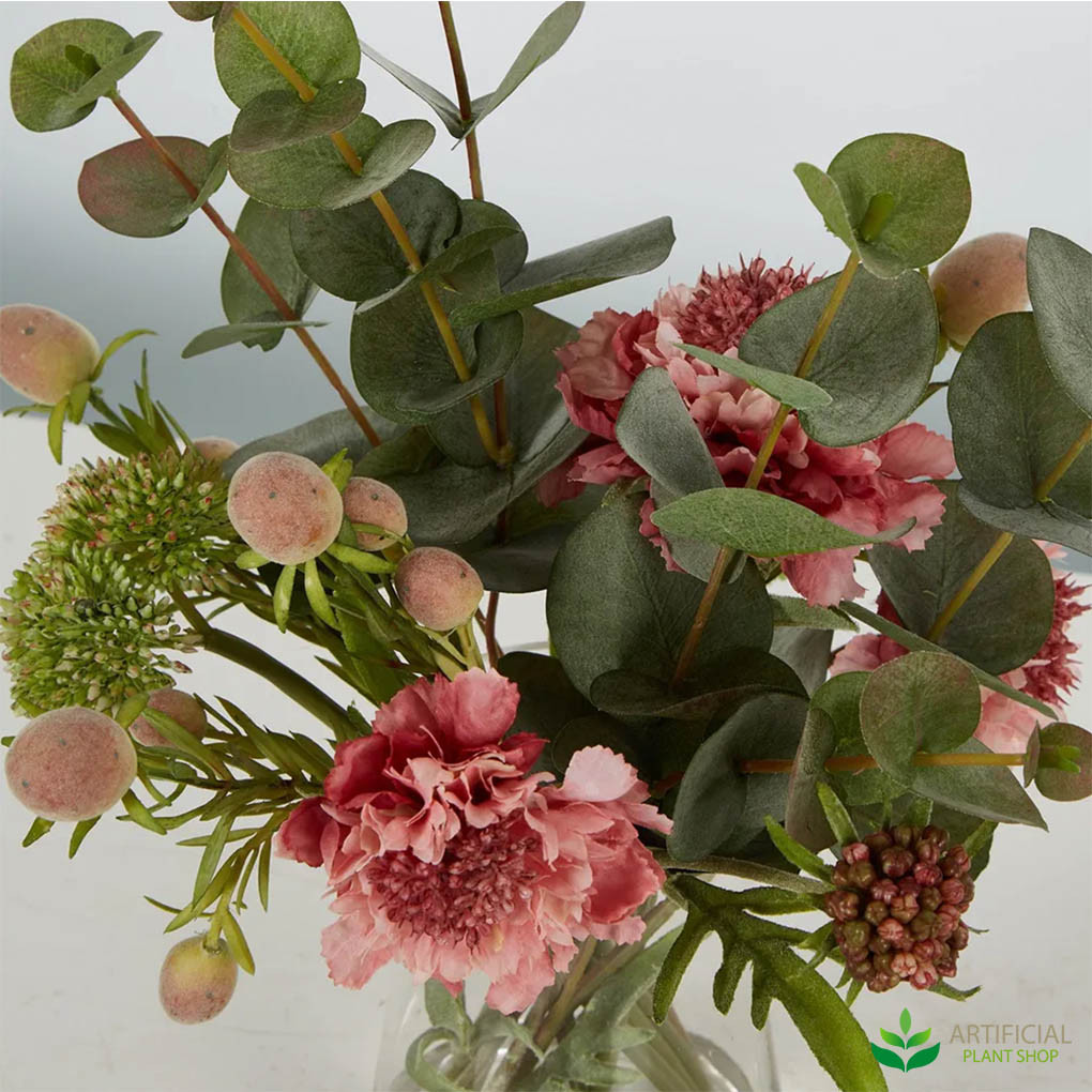 carnation flowers and eucalyptus leaves
