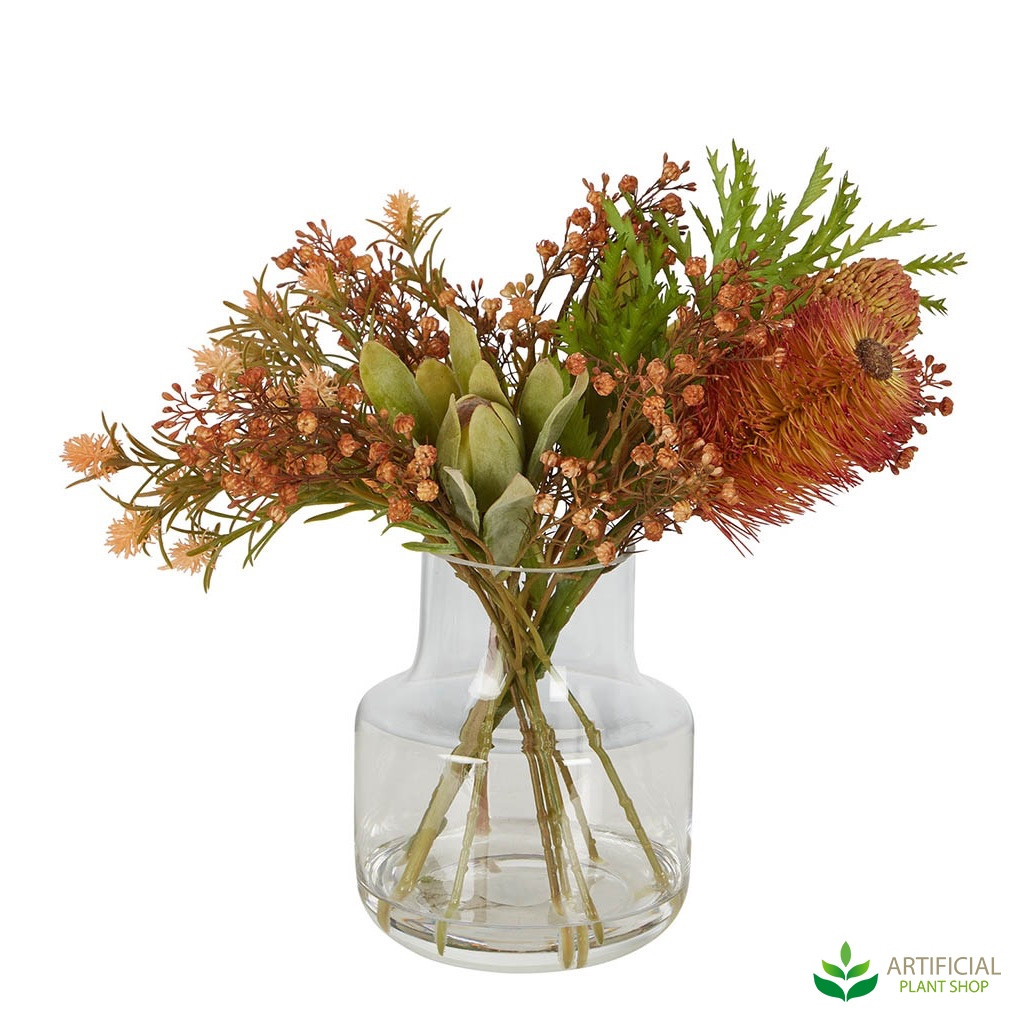 orange protea flower arrangement