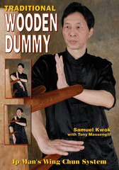 The Wing Chun wooden training dummy is a training device designed to correct technique and structure as well as increase power, speed, accuracy, and conditioning.
Learn the true Original Ip Man’s Wing Chun Wooden Dummy form from Grandmaster Samuel Kwok. This book is a complete step-by-step guide to the Wooden Dummy hands techniques, legs application, and footwork. All the original sections are demonstrated clearly from start to finish, in different camera angles to facilitate easy and accurate learning. There also is a description of each segment and its most common training mistakes to improve not only your technique, but your level of understanding. In addition to teaching the skills on the wooden dummy, Grandmaster Samuel Kwok demonstrates the applications of the wooden dummy training techniques on a partner, giving an excellent idea of the combat effectiveness of each movement.
