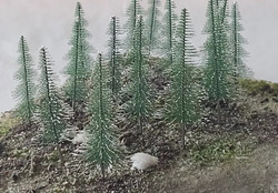 Rock Island Hobby 24202  Snow Covererd Fir Trees 90mm (8) & 110mm (8)