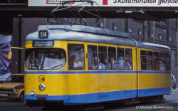 Arnold HN2603 Tram Duewag GT6, one front light, yellow/blue livery "Essen", ep. IV-V N Gauge
