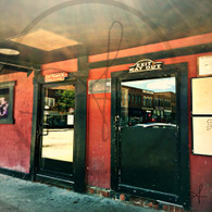 Two Doors Red Building