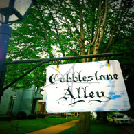 Cobblestone Alley Sign
