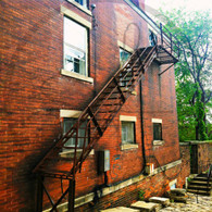 Cobblestone Alley Brick Fire Escape