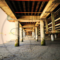 Beach Poles Under Pier