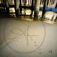 Under Pier Bird Prints on Sand