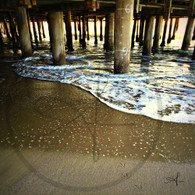 Sea Foam Under Pier