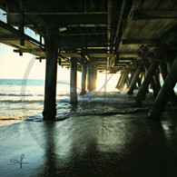 Sun Waves Poles Under Pier