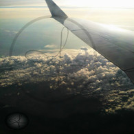 Belize Clouds and Plane Wing