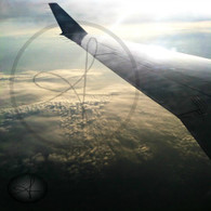 Belize Sun Glow Plane Wing Tiny Clouds